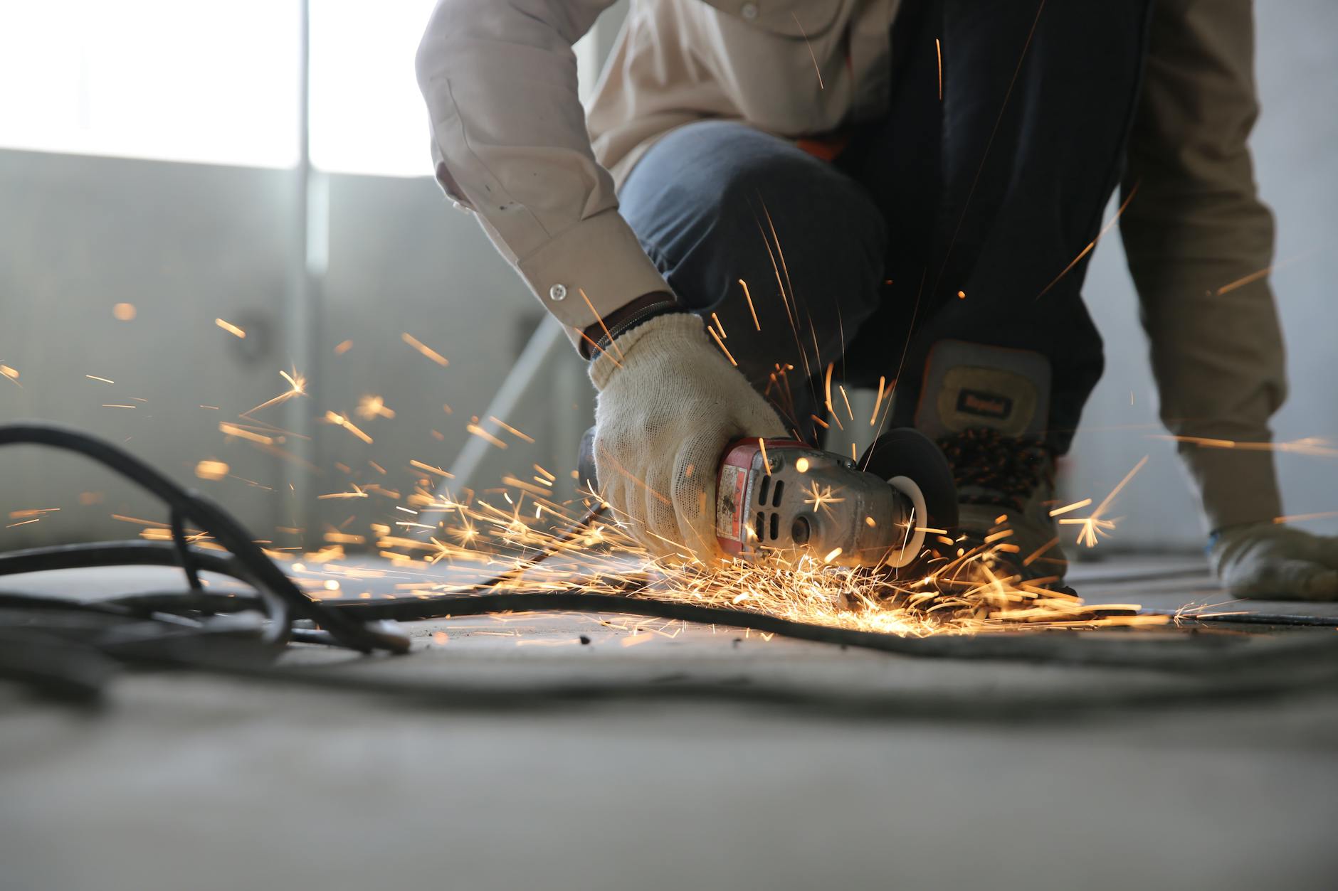 person holding grinder